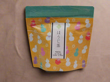 Load image into Gallery viewer, Tea package with colorful design on a white background