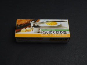 STAINLESS STEEL GARLIC SQUEEZER
